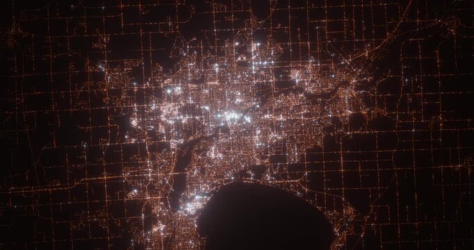 Appleton (Wisconsin, USA) aerial view at night. View on modern city from space. Camera is zooming in, rotating counterclockwise