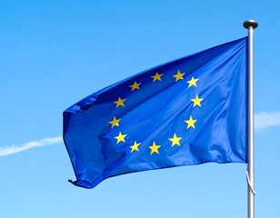 EU flag waves under a blue sky