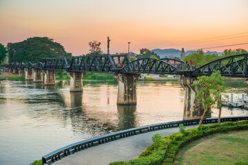 Fototapeta premium Sunset landscape with railway bridge on river Kwai, Kanchanaburi, Thailand