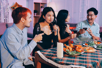 Diversity, dinner and group of people toast celebration together at party. Friends, happy and celebrate with food, wine and friendship for love, support and cheers champagne at business function