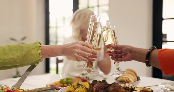 Hands, cheers and celebration with champagne, home or friends with lunch for reunion in dining room. Happy, old women and toast with alcohol in gathering, together and bonding with brunch in house