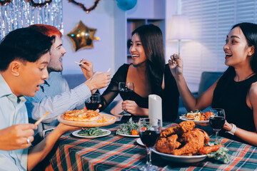 Diversity, dinner and group of people toast celebration together at party. Friends, happy and celebrate with food, wine and friendship for love, support and cheers champagne at business function