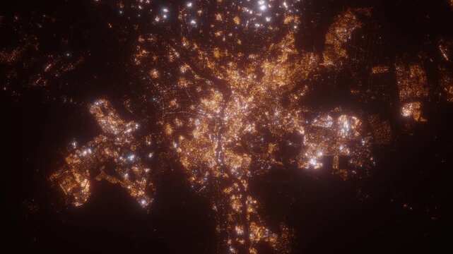 Cairo (Egypt) aerial view at night. Top view on modern city with street lights. Camera is zooming out, rotating clockwise