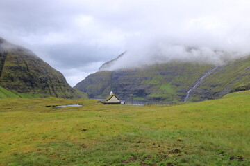 church near the Saksun Heritage Farm with grass roofs, Streymoy, Faroe Islands, Denmark
