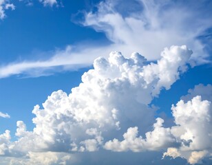 Fluffy white clouds in a blue sky