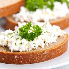 Fresh cottage cheese on dark bread with parsley