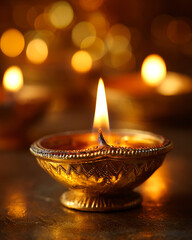 Glowing diya closeup shallow dof festive celebration