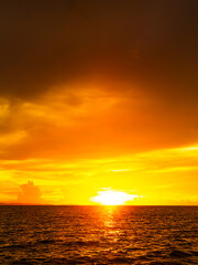 Sea sunset sky evening sunrise cloud weather dramatic landscape goldent and indigo color gradient pastel horizon, twilight yellow golden reflection morning nature environment energy ecosystem change.