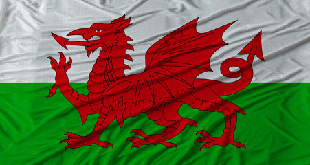 Welsh flag waving. Flag of Wales with cloth texture