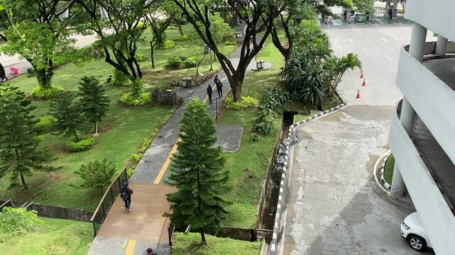 View of an International Airport Toll Gate with Lush Greenery and Clear Skies