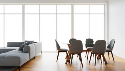 Minimalist dining area with glass table, grey chairs, and sofa
