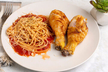 spaghetti  with seasoned   chicken drum sticks