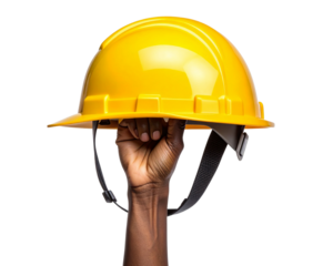 A worker’s hand lifting a yellow safety helmet high above the head by the strap, dyna