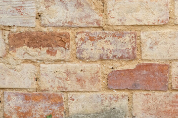 Old brick wall showing signs of age and weathering