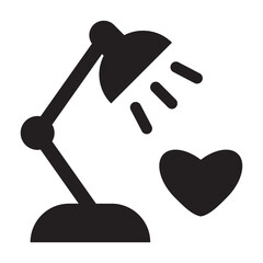 Desk lamp with heart icon, symbol of love, focus, and warm romantic atmosphere.