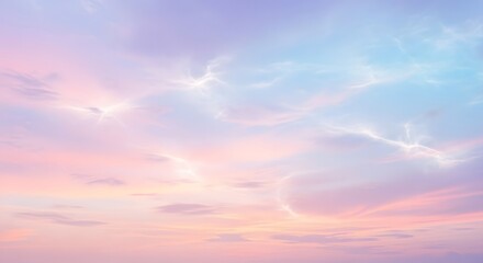 Obraz premium Serene pastel sky at sunset with soft clouds and gentle hues of pink and blue, perfect for relaxation