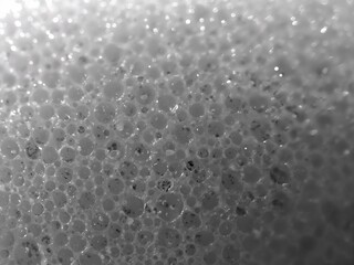 Abstract Black and White Foam Bubbles Texture Close-Up: Macro Photography of Shiny Round Effervescent Soap and Water Surface in Modern Minimalistic Monochrome Design