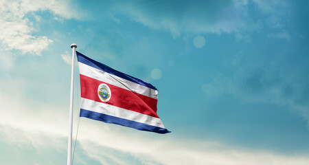 Costa Rica national flag fluttering. The flag blowing in beautiful soft sky. Costa Rica national flag for independence day.