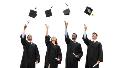 Diverse group of graduates celebrating their academic achievement by throwing caps in the air.