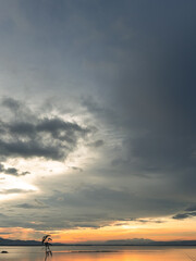 Dramatic Sunset Over Calm Water