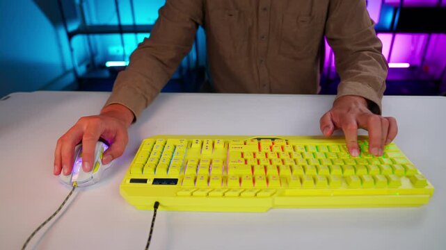 Man using keyboard and mouse for gaming session