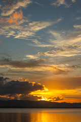 Fototapeta premium Scenic Golden Sunset Over Lake