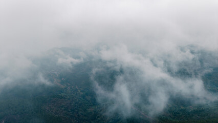 Aerial view of mountains in autumn mist