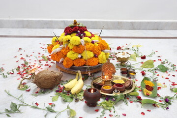 colorful flowers stacked up to create bathukamma, a specific hindu god worshiped in south india