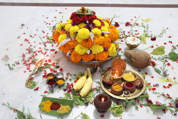 colorful flowers stacked up to create bathukamma, a specific hindu god worshiped in south india