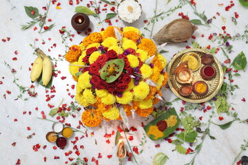 colorful flowers stacked up to create bathukamma, a specific hindu god worshiped in south india