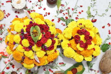 colorful flowers stacked up to create bathukamma, a specific hindu god worshiped in south india