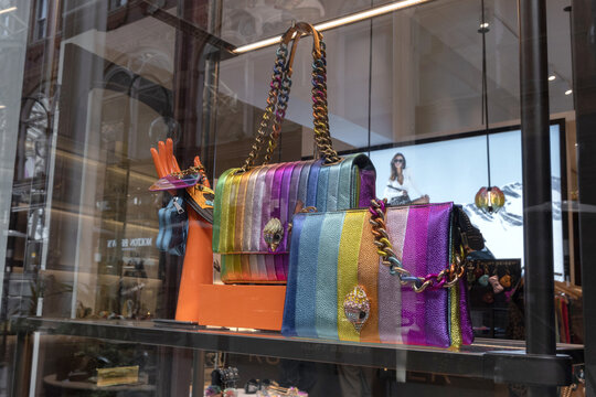Leeds United Kingdom- September, 27, 2025: Luxury multicolor handbags by Kurt Geiger in Boutiqque setting, store window in Leeds Arcade