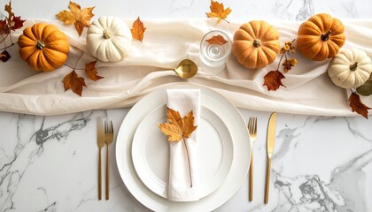 Autumn place setting with pumpkins & leaves on a marble background, for Thanksgiving