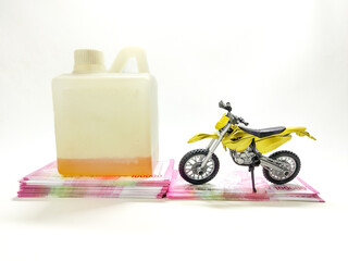 Expensive Gasoline Concept Motorcycle and Fuel Container