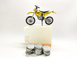 Expensive Gasoline Concept Motorcycle on Fuel Can with Money