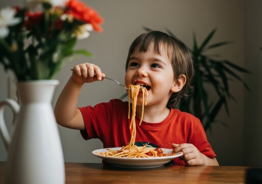 Happy child eating spaghetti with a big smile - Powered by Adobe