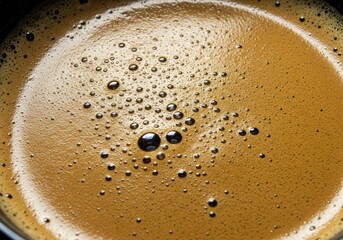 Close-up of a rich, frothy espresso with bubbles
