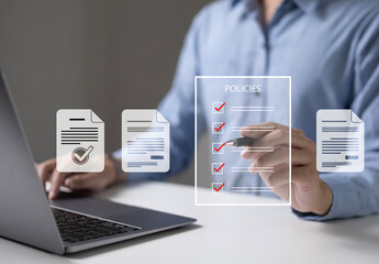 Businessman reviews company policies, digital documents, ideal for policy management, business compliance, document approval, and corporate governance visualization.