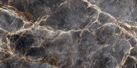 Elegant dark gray marble surface with golden veins, ideal for backgrounds and textures