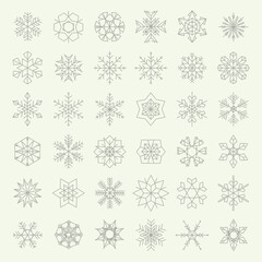 Collection of thirty six different snowflake designs