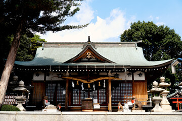 Traditional Japanese Shinto Shrine Honden/Haiden with Stone Stairs and Lanterns