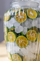 Homemade Shikwasa Syrup in a Glass Jar with Rock Sugar(シークワーサーシロップづくりと氷砂糖の瓶詰め）