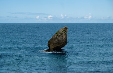 Arrowhead-shaped limestone pinnacle of Buelna, shaped by the sea in the eastern coast of Asturias, Northern Spain