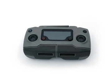 Fototapeta premium Drone Remote Controller with Antennas, Sticks, Display, and Phone Mount on White Background