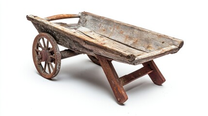 Rustic wooden wheelbarrow, weathered and aged, isolated on white.