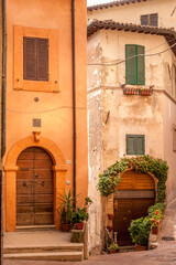 Narrow Medieval Alley and Old Street and Weathered Facade in Trevi, Umbria, Italy