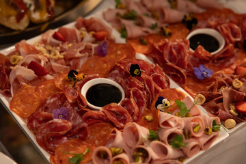 Gourmet Charcuterie Platter with Cured Meats and Edible Flowers
