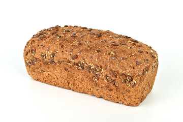 A loaf of bread with nuts on top