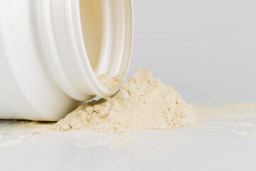 Protein Powder with Plastic Bottle on White Background Nutrition Photostock