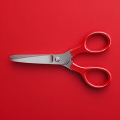 Bright red craft scissors with serrated blades for decorative cutting